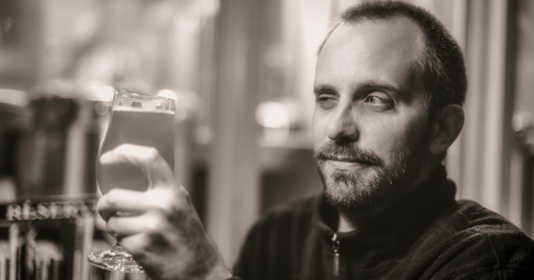 brewer analyzing the beer in his glass