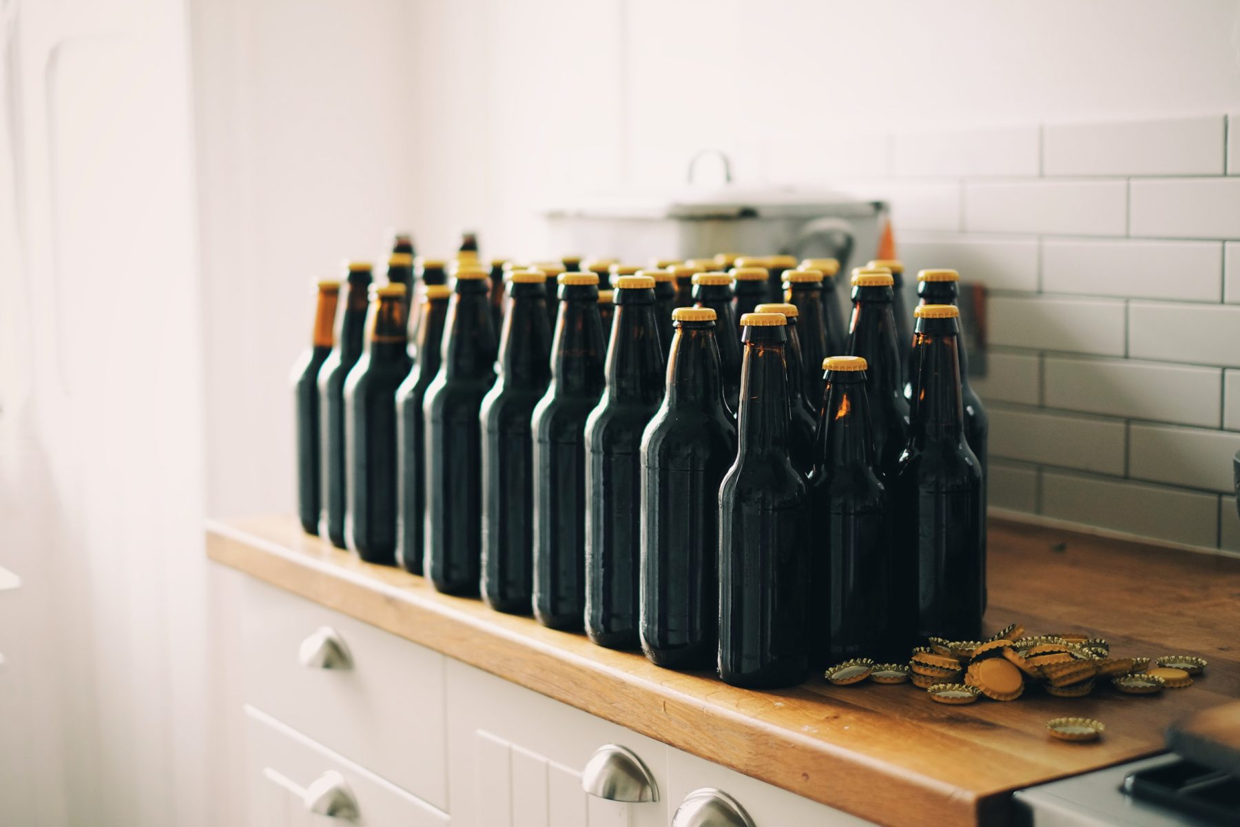 Bottles of beer on a counter after bottling